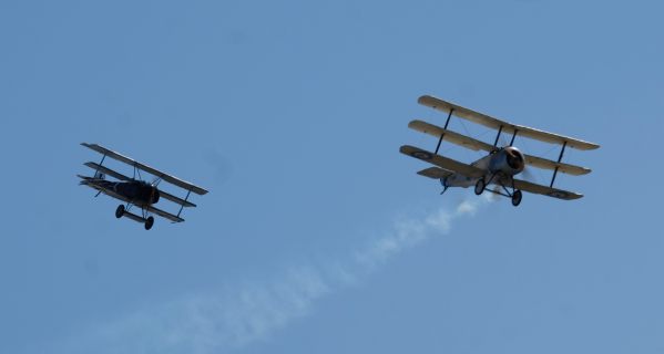 The Fokker Triplane pretending to shoot down the Sopwith Triplane at the Duxford 2019 Airshow.