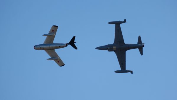 Shooting star chases MiG 15 in the skies over Duxford at the 2019 Airshow.