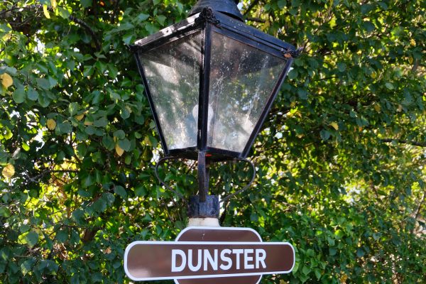 West Somerset Railway - lamp at Station Sign at Dunster.