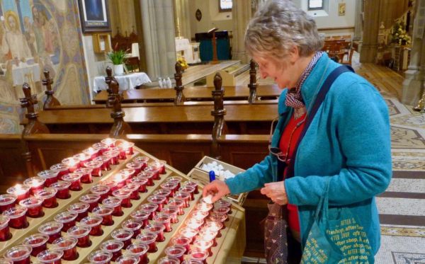 Angie placing the second candle. One for Jim & Rose, her parents and the second for Di. St Eunan’s Cathedral, Letterkenny, Donegal on 7 June 2019.