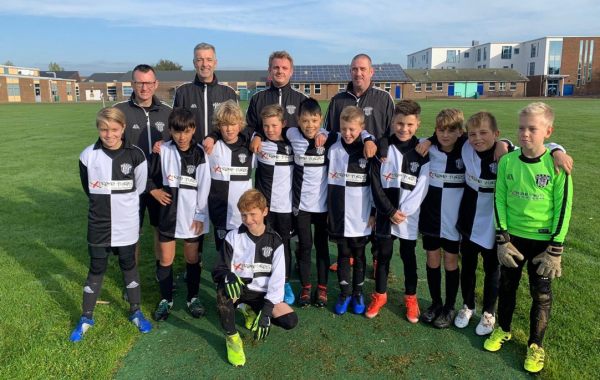 East Preston U11 football team and coaches.