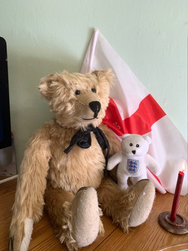 Bertie, Ellen, an England flag and a candle lit for Diddley and the "Beautiful Game".