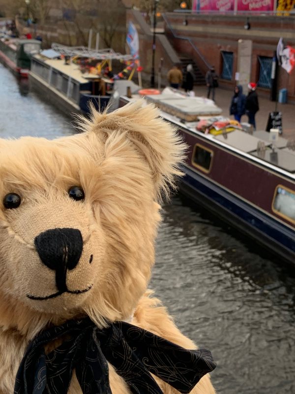 Bertie, with some of the boats from teh Floating Christmas Market behind.