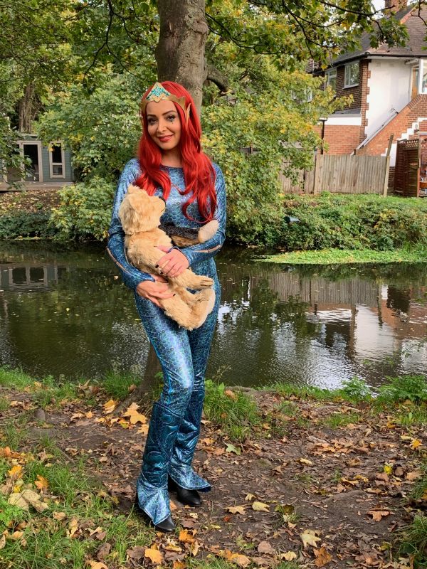 Bertie in the arms of a Mermaid by the River Wandle.