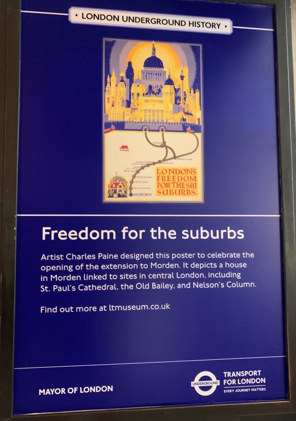 Poster depicting "Freedom for the Suburbs" with a copy of the original designed by Artist Charles Paine.