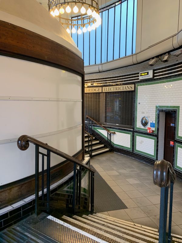 Curved stairs at Balham, but still those wonderful handrails.