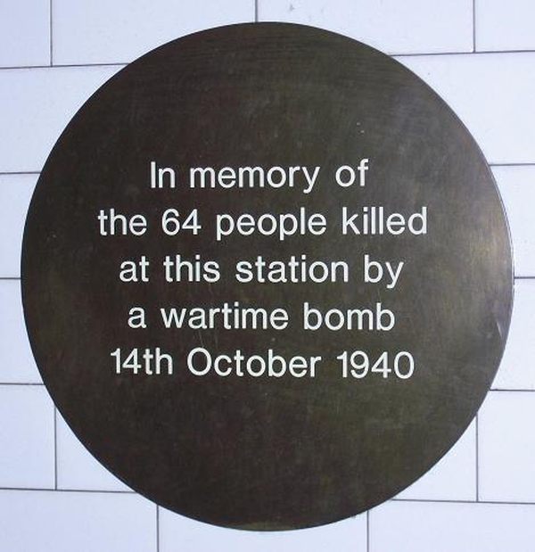 The original plaque referring incorrectly to the 64 people killed.