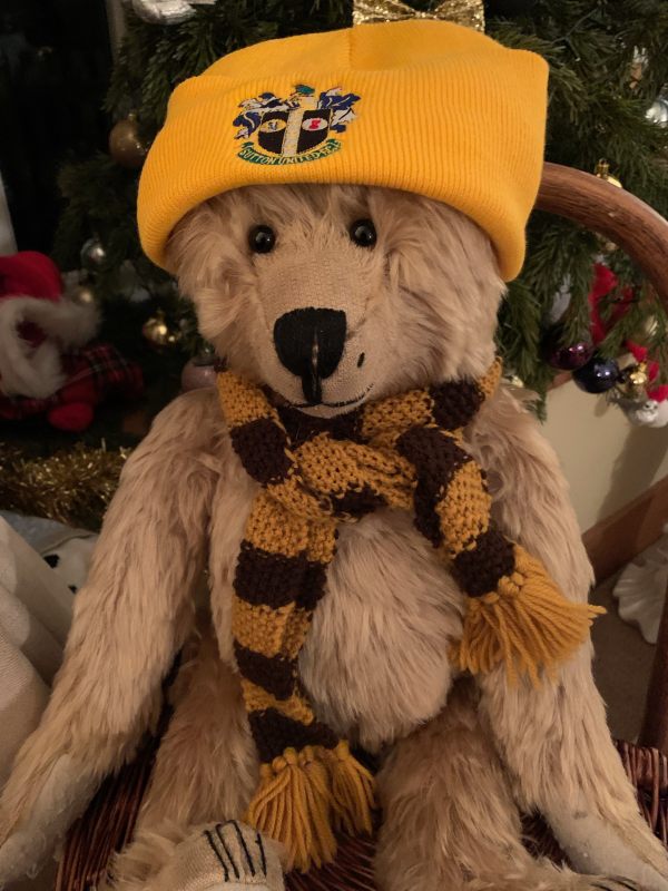 Bertie wearing his new Sutton United hat.