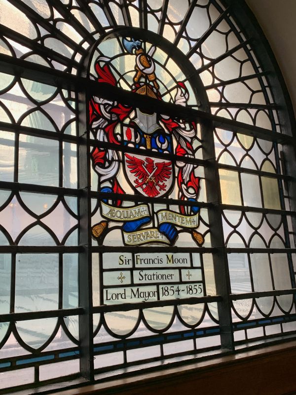 Stained glass window in St Botolphs dedicated to Sir Francis Moon, Stationer, Lord Mayor 1854-1855.