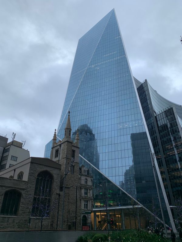 St Andrew Undershaft. 1532. A rare church that survived both The Great Fire of London and the Blitz.The "Scalpel" towering behind, reflecting the "Gherkin".