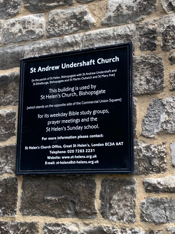 Noticeboard explaining that St Andrew Undershaft Church is now used by St Helen's Church, Bishopgate.