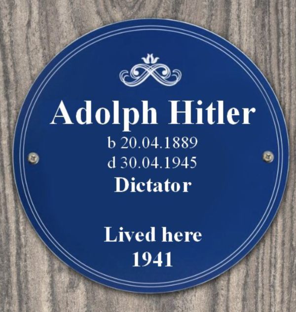 Blue plaque stating "Adolf Hitler b 20.04.1889 d 30.04.1945 Lived here 1941".