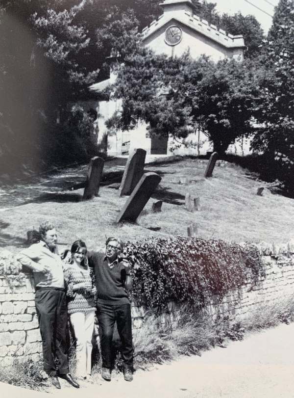 Frank Mansell left. Laurie Lee right. And a friend (not Diddley…) Outside Slad Church.