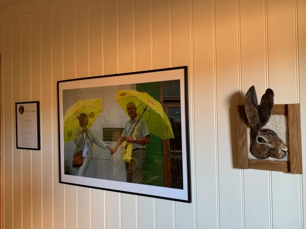 Three pictures on the wall. A poem, Diddley and Bobby outside the Shredded Wheat factory (with matching Shredded Wheat umbrellas) and Hefyn Hare - a talking picture.