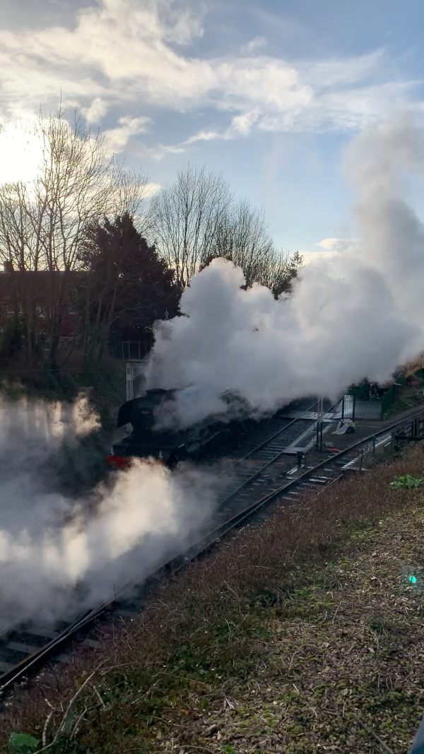 The Flying Scotsman departing Alresford in an impressive cloud of steam.
