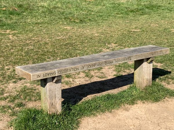 Inscription on the bench, which reads: In loving celebration of John and Diana Hargreaves.
