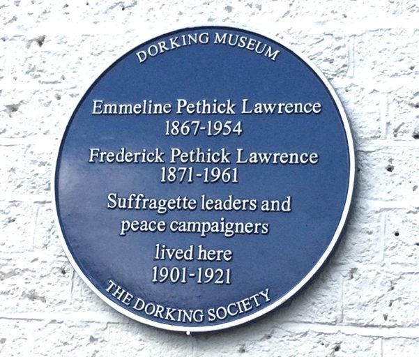 Blue Plaque by Dorking Museum / The Dorking Society announcing Emmeline Pethick Lawrence and Frederick Pethick Lawrence lived in the Dutch House 1901-1921.