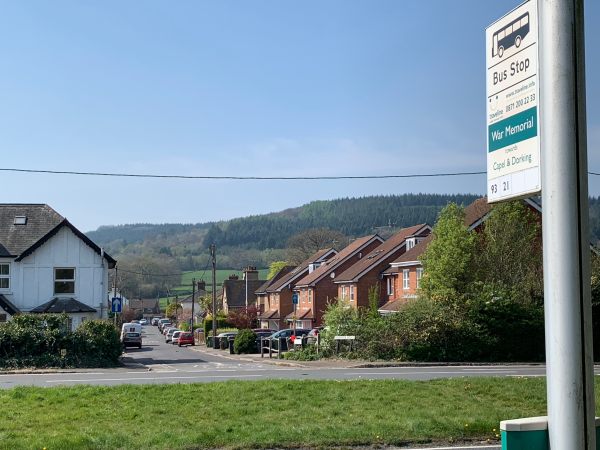 Here's the bus stop and you can see Vitae Cottage with the hills of Redlands beyond.