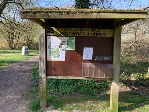 National Trust Notice Board for Holmwood Common. The leaflet dispensers are empty.