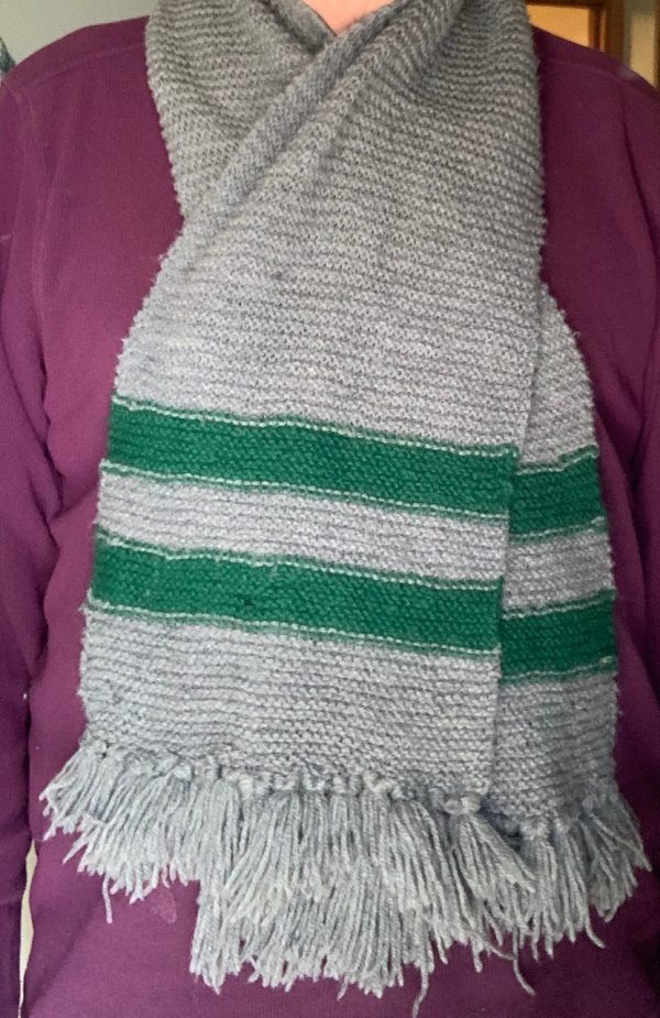 The Cheam Park Farm Primary School scarf. Grey, with two green "tramlines" across the ends.