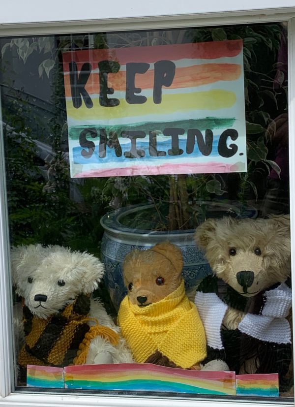 Eamonn sat in the window of Laurel Cottage wearing his new scarf, with Trevor on the left wearing his black and yellow striped scarf and Bertie modelling the new Black and White one.