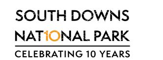 South Downs National Park - Celebrating 10 Years. (The "io" in national have been highlighted in yellow to represent a "10")