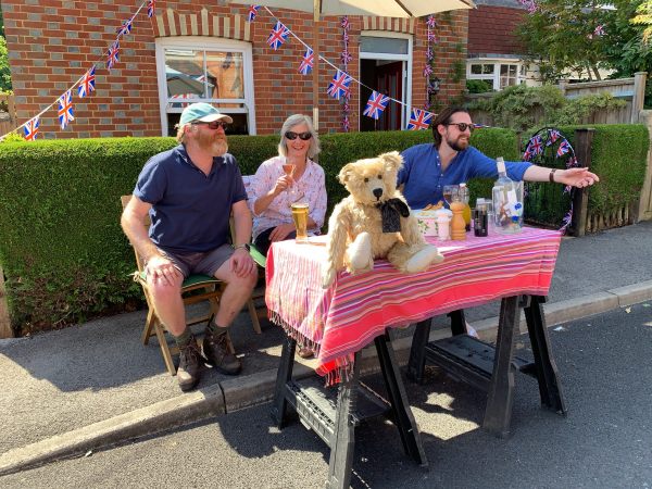 Bertie sat on one of the street party tables.