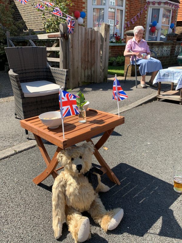 Bertie sheltering from the sun under one of the tables.