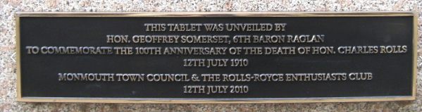 Rededication plaque on Charles Rolls statue in Monmouth 2010. Text reads: "This tablet was unveiled by Hon Geoffrey Somerset, 6th Baron Raglan to commemorate the 100th anniversary of the death of Hon Charles Rolls 12th July 1910. Monmouth Town Council & the Rolls-Royce Enthusiasts Club 12th July 2010."