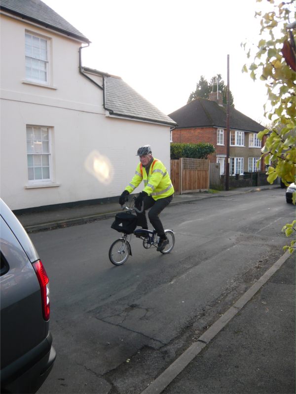 Bobby on the Brompton wearing Hi-Vis and Hard Hat.