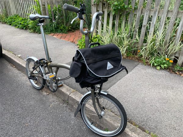 The Brompton stood up against the kerb.