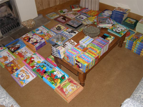 Sorting out dozens of brand new children's books.