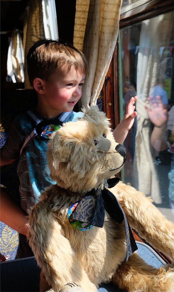 Jay, with Bertie, waving from a steam train. 2018.
