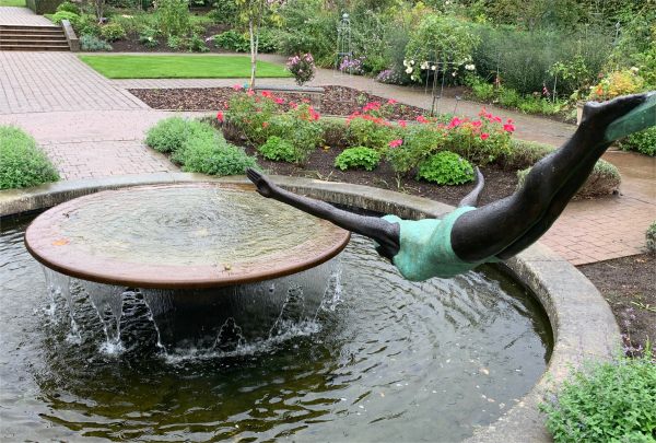 We loved this statue glistening in the summer rain.