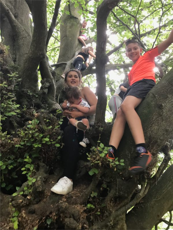 Some of Bobby's grandchildren (plus great grandson) in the Witches Broom Tree.