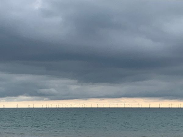 Under a threatening sky that soon dissolved into sunshine. The large off-shore Rampion Wind Farm.
