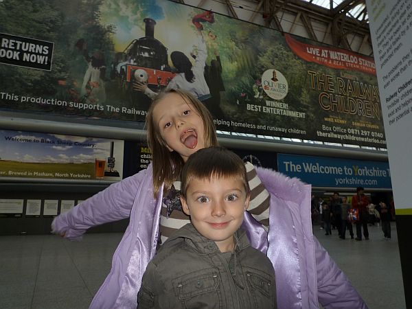 Layla and Sonny posing at Waterloo Station.
