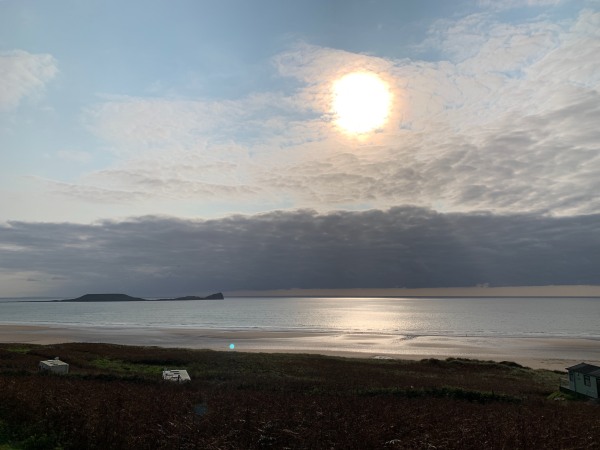 Sunset over Worms Head island.