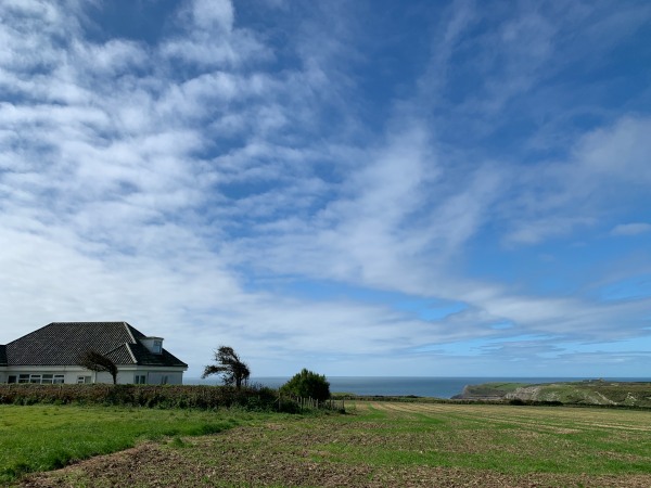 Today's view of Ty Dwr and across to the sea.