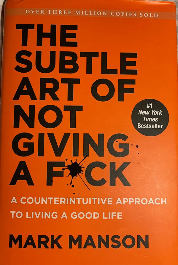 Who Bleedin cares? Front Cover of the book "The Subtle Art of Not Giving a F*ck" by Mark Manson.