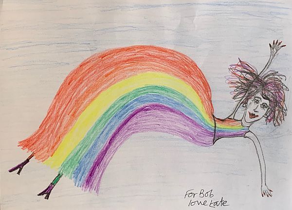 Drawing of a lady in a rainbow dress - by Kate.