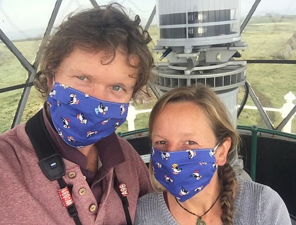 Richard and Giselle wearing their Puffin facemasks!
