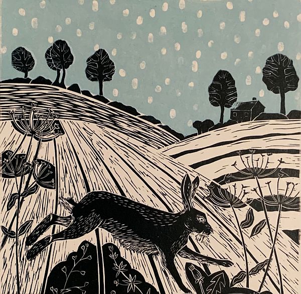 Linocut print of a hare bounding amongst rolling hills.