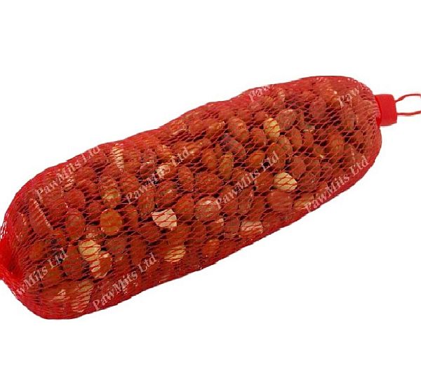 Red net full of peanuts. Ready to hang in the garden.