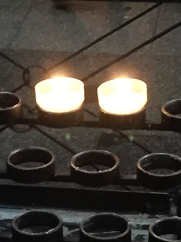 Two candles - one lit for Diddley, the other for Don Dawes.