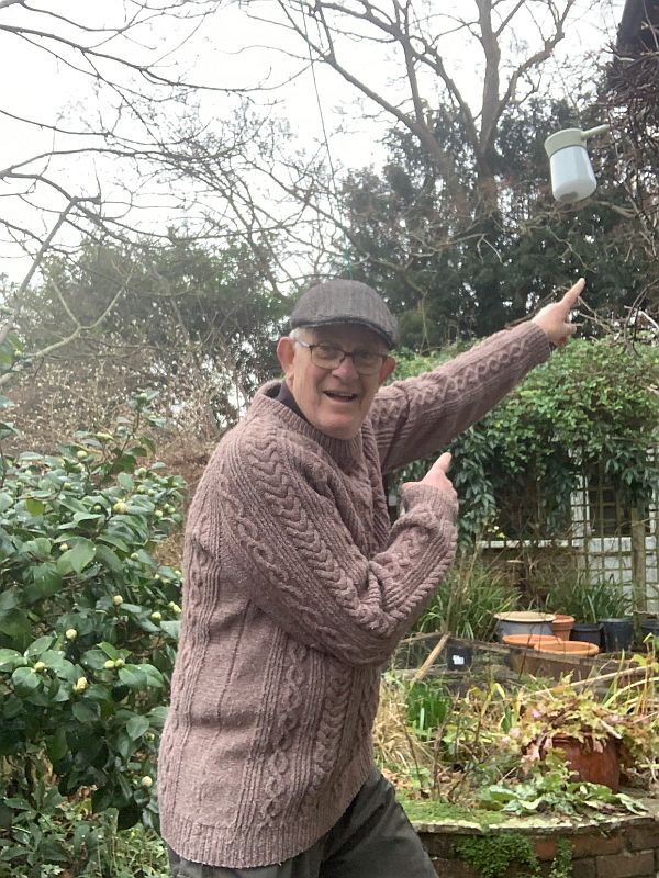 Bobby wearing Wendy's Jumper in the garden.