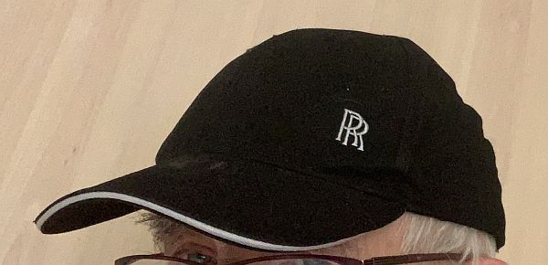 Black Baseball Cap with silver RR logo on it.