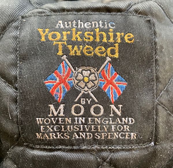Label of Bobby's Authentic Yorkshire Tweed Cap by Moon. Woven in England exclusively for Marks & Spencer.