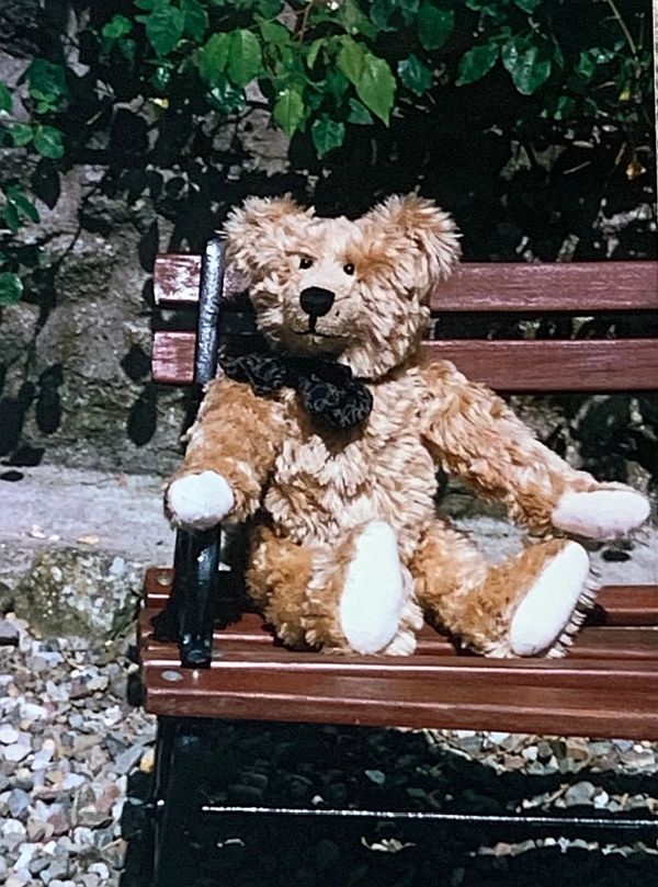 Bertie sat on a bench.