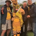 The Greatest Day for Sutton United: Bobby, Jenny (mascot, a giraffe), David, Andrew.